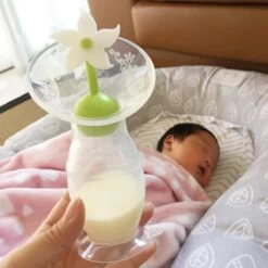 HAAKAA - Siliconen Borstkolf - 100ml + Stopper Witte Bloem - Borstvoeding - Lekschaal -Winkel voor babyproducten 1200x1200 1514
