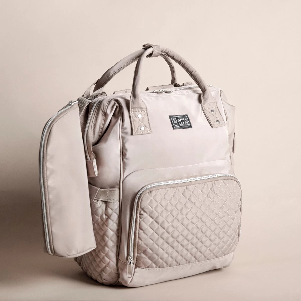 NanaBeebi Luiertas Rugzak met Verschoonmatje - Beige Taupe - Inclusief flessenwarmhouder - kinderwagenhaken en isoleervak NanaBeebi Luiertas Rugzak Met Verschoonmatje - Beige Taupe - Inclusief Flessenwarmhouder - Kinderwagenhaken En Isoleervak -Winkel voor babyproducten 1200x1200 1750